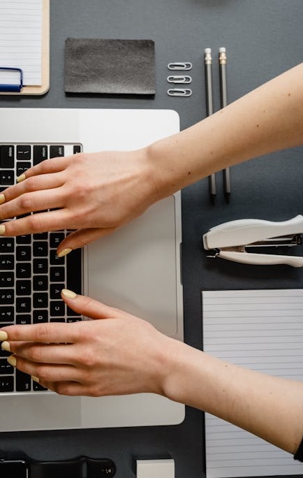 A YouTuber setting up a camera and microphone, emphasizing the importance of high-quality content to complement the strategy of buying YouTube subscribers