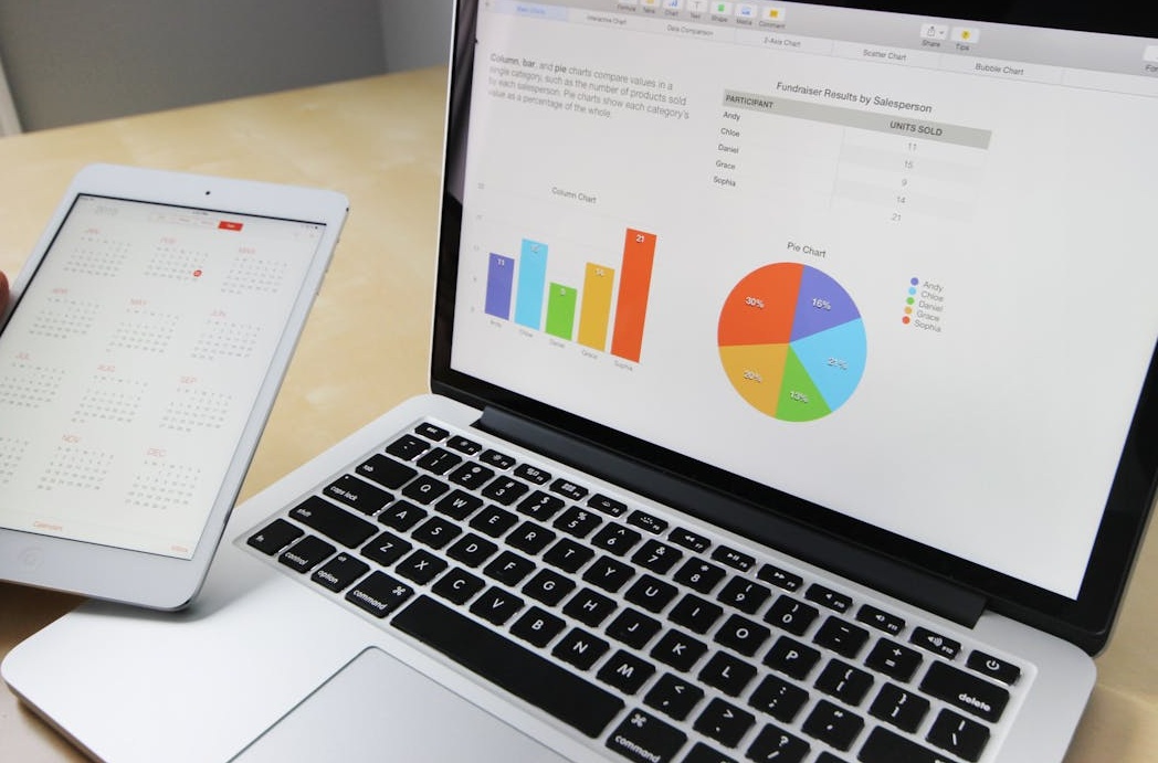 Business professionals collaborating around a screen with data, illustrating strategic marketing