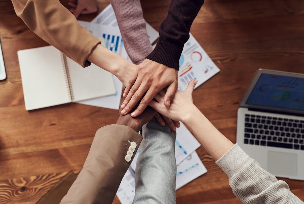 A brand celebrating success after implementing a stable Twitter follower strategy