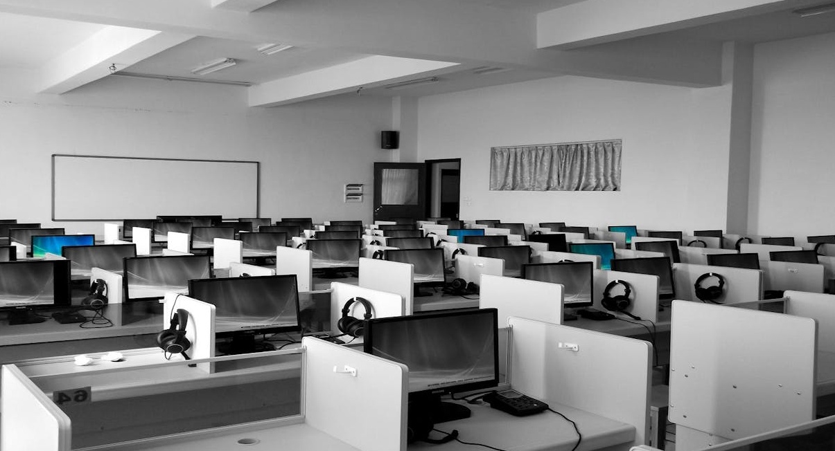 A group of professionals in a meeting, symbolizing building credibility and social proof for a YouTube channel