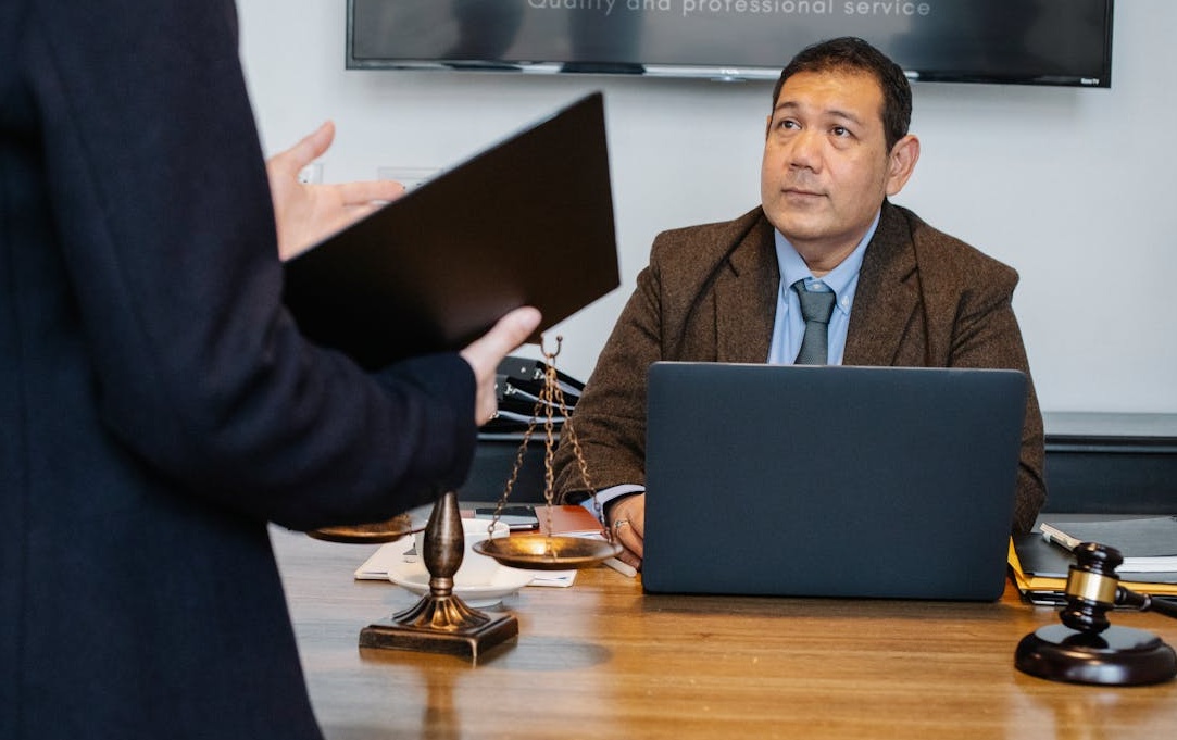 Digital marketing professional analyzing social media data on a laptop