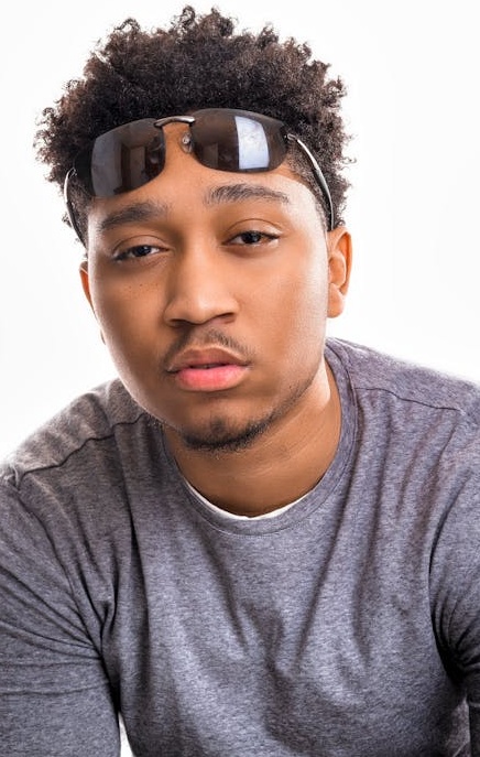 Diverse group of people watching videos on various devices, representing YouTube audience