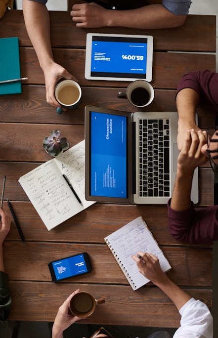 Group of People Collaborating and Connecting in an Office Setting